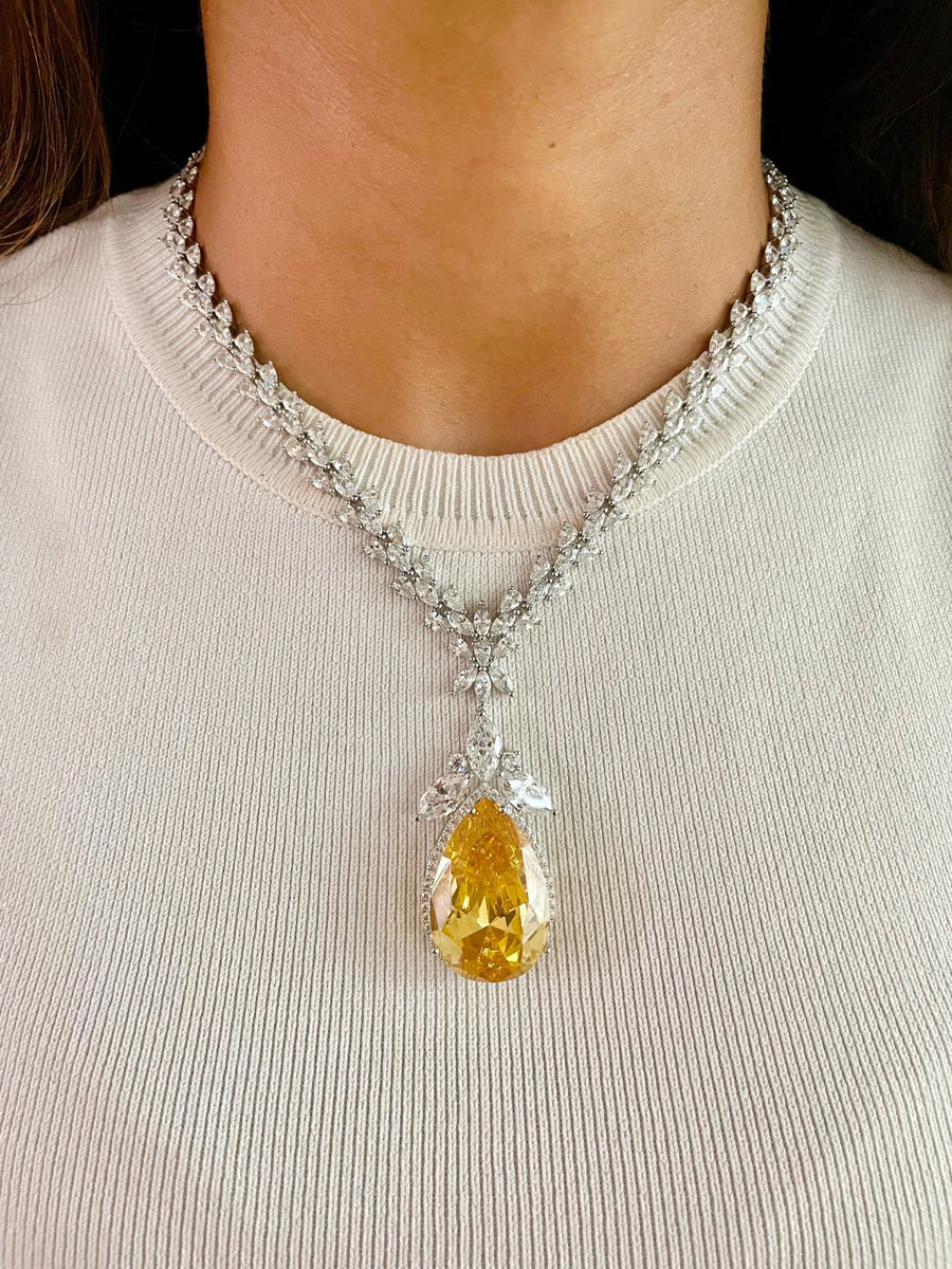 طقم نويل زمرد (اقراط وقلادة)